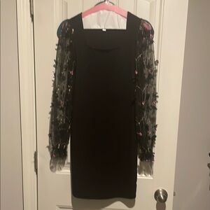 Elegant Black Dress with Floral Sleeves